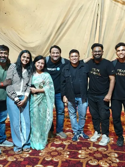 A candid moment with our clients and the backstage team. We work closely with everyone to ensure a smooth and happy experience.