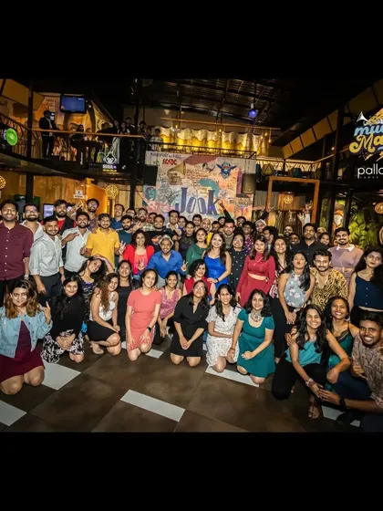 We are more than a dance school; we are a community. This is our crew at a "Mucho Mambo" social night, celebrating our shared passion for dance and connection.