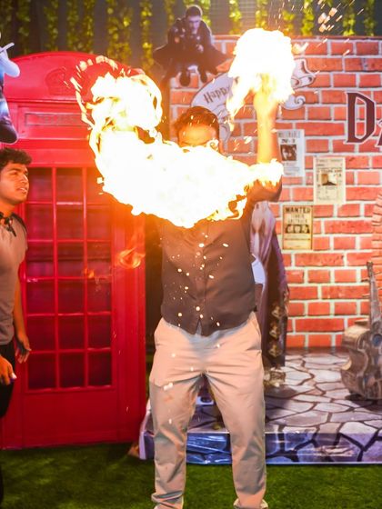 A spectacular fire show by a magician, adding a thrilling and magical performance element to the Harry Potter celebration.