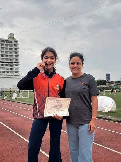 A proud moment for our Wings Centre athlete, Aadhrika, with her coach after securing a bronze medal in the 400m at the CISCE Nationals.