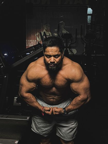 If you want to make progress, step outside your comfort zone. A powerful most muscular pose.