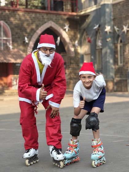 Another happy skater posing with our skating Santa. We make sure our events are memorable for everyone.