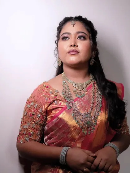 A beautiful portrait of a bride in her reception attire, looking elegant and graceful.