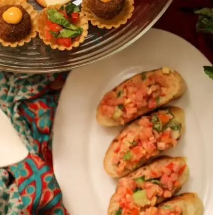 Classic tomato bruschetta, featuring fresh diced tomatoes and basil on perfectly toasted bread. A timeless Italian appetizer that I make with the freshest ingredients.