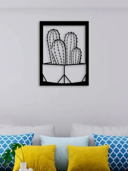 A modern and minimalist take on botanical art, this piece features a potted cactus in a clean, black iron frame. It's a quirky and stylish way to add a touch of desert chic to your home decor.