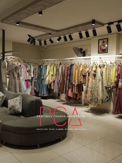 A view of the client seating area, with a curved sofa that allows for comfortable consultation and viewing of the collections.