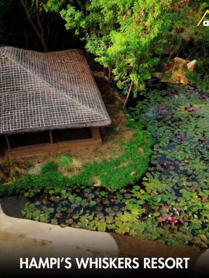 A tranquil cottage at Hampi's Whiskers Resort, situated by a serene lily pond. This stay offers a peaceful retreat, allowing you to relax in nature after exploring the magnificent ruins of the Vijayanagara Empire.