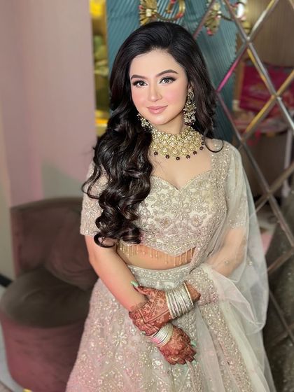 A soft pink glam look for my beautiful client. The makeup is romantic and pretty, with a focus on rosy cheeks and glossy lips.