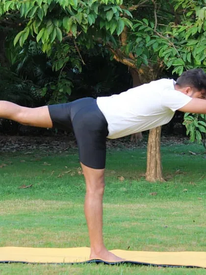 This variation of Virabhadrasana III (Warrior III) is a test of balance and focus. It strengthens the legs and core while teaching you to find stillness and stability on one foundation.