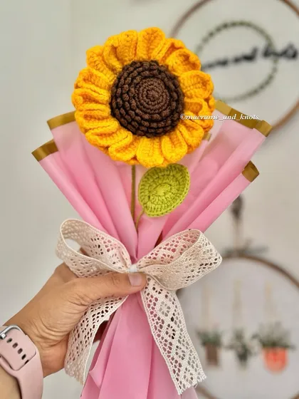 A single, large crochet sunflower makes such a happy and bold statement. It's a perfect, simple gift to show someone you care, and this one is wrapped and ready to bring a smile to someone's face.