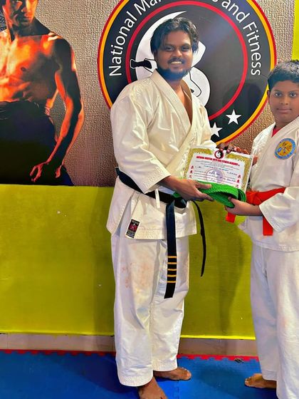 National Martial Arts and Fitness Academy - Kids Martial Arts & Fitness The Journey of Discipline: Belt Graduations photo 15