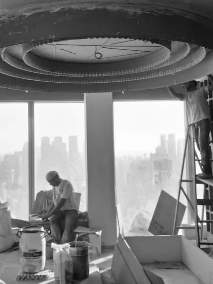 The Midas Lounge under construction, with our team installing the custom circular ceiling element against the backdrop of the Mumbai skyline. This is where vision starts to become reality.