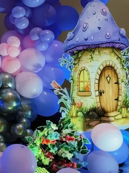 A close-up of the adorable mushroom house prop, a key element in our fairy and woodland themes.