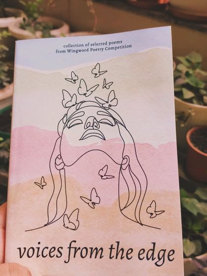 A close up of the anthology 'Voices from the Edge.' The cover art is as creative as the poetry inside. We take great care in designing our books to create a beautiful home for your words.