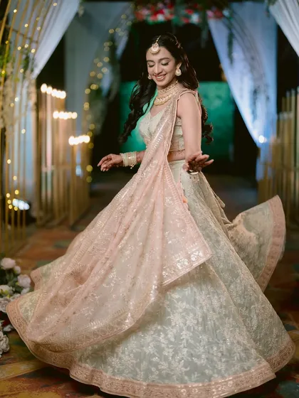 A joyful twirl on the dance floor. I love capturing the bride in her element, and Zaee's happiness is infectious in this shot from her Sangeet night.