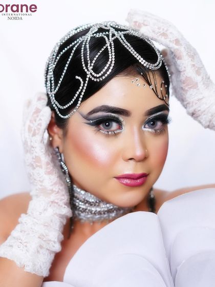 The lace gloves and direct gaze create a look that is both vintage-inspired and futuristic.