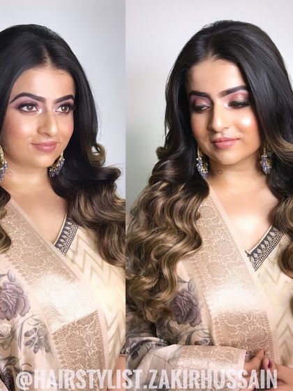 A classic Hollywood waves hairstyle, perfect for a glamorous reception or cocktail party. This look is all about shine, volume, and perfectly sculpted waves that frame the face.