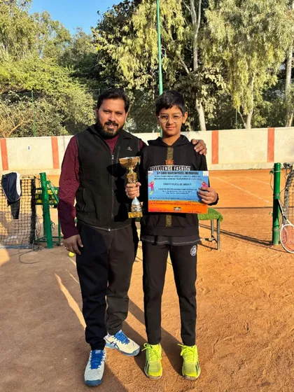 We build champions from a young age. Here I am with Tyakshi Lather, the winner of the AITA Under 12 Championship Series. Her victory is a testament to our focus on foundational skills and competitive mindset.