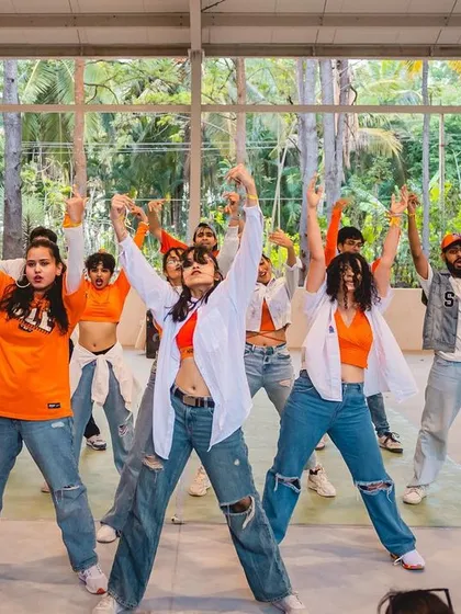 A fun, colorful crew brings a playful energy to their performance at Spectra.