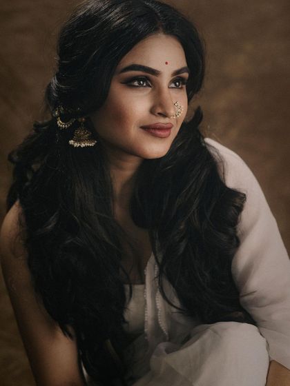 Another portrait from the same series, showcasing a soft and dreamy expression. The makeup is designed to be versatile, looking beautiful from every angle and in different lighting.