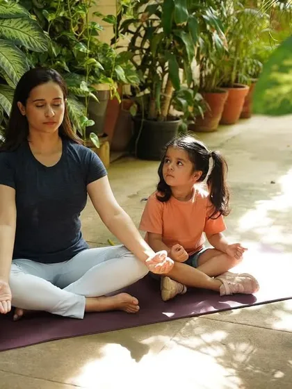As a mom myself, I understand the journey. Finding moments of peace and connection, like doing yoga with my daughter, is just as important as any workout. This is about creating a healthy lifestyle for you and your family.