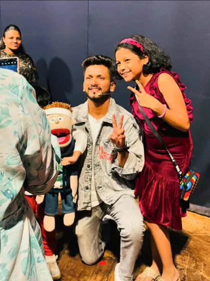 A young fan poses for a picture with me and Bunny. These moments are priceless.