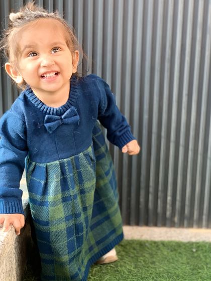 A happy shot of my daughter in her Republic Day outfit from Firstcry. The dress is warm, stylish, and perfect for the occasion.