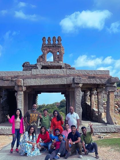 Our group at the ruins of the Queen's Bath in Hampi.