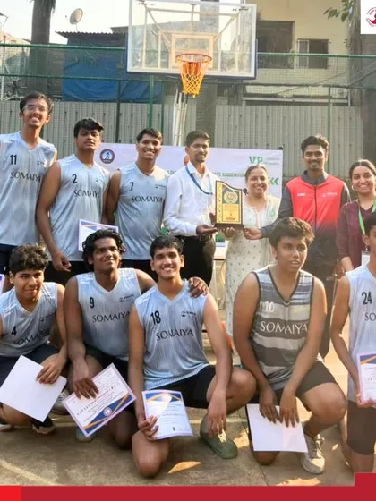 The champion K. J. Somaiya Polytechnic Boys Basketball Team celebrates with their trophy after defeating Vidyalankar Polytechnic College to book their place at the state level.