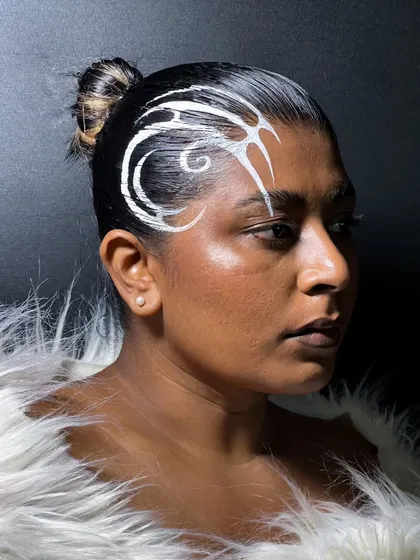 A different angle of the "hair liner" look, showing how the white graphic design follows the curve of the hairline.