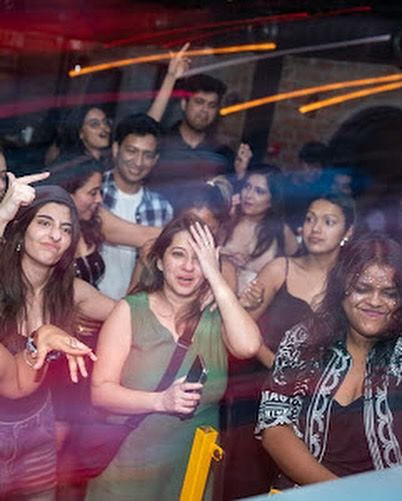 The dance floor at Watson's is a blur of motion and energy. I keep the beats coming to ensure the party never stops.