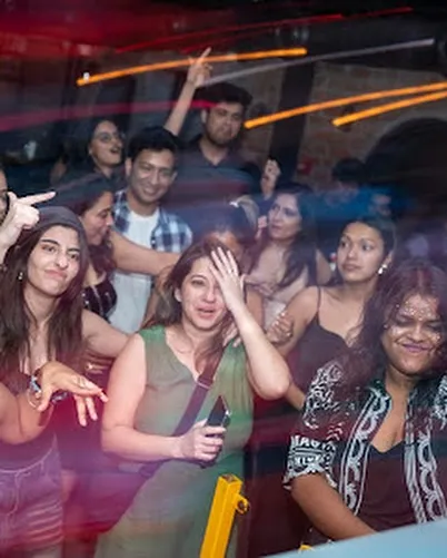 The dance floor at Watson's is a blur of motion and energy. I keep the beats coming to ensure the party never stops.