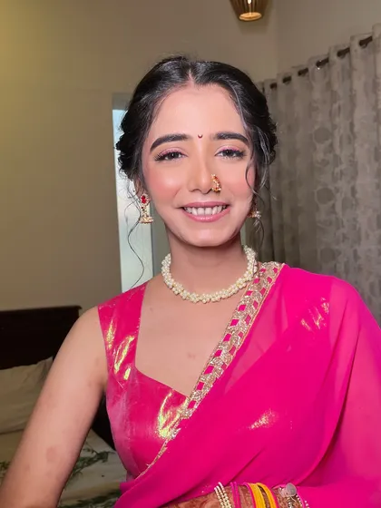 A beautiful portrait of my happy bride. The soft makeup and simple pearl necklace create a look of effortless elegance.