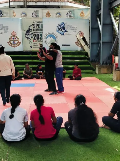 Learning happens through clear, step-by-step instruction. In this photo, our instructor demonstrates a close-quarters defense technique to an attentive group, breaking down complex movements so they are easy to understand and replicate.