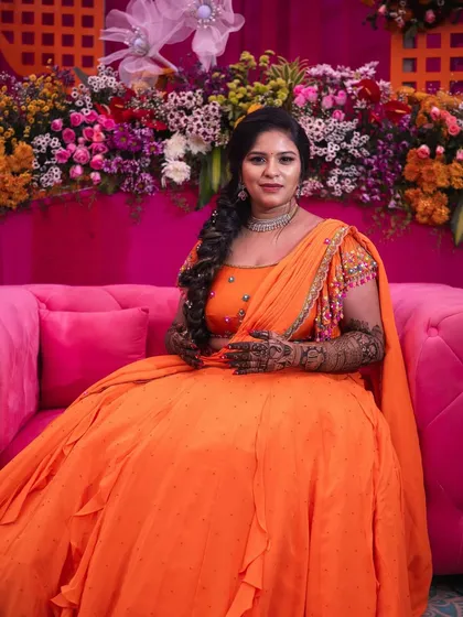 A happy and serene bride at her mehendi ceremony.