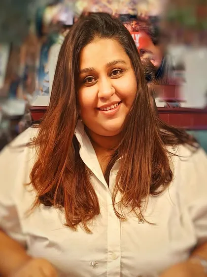 A portrait of our co-founder and creative genius, Chef Pooja Sachdev. Her decades of experience as a food stylist and chef inspire the storytelling in every dish we create.