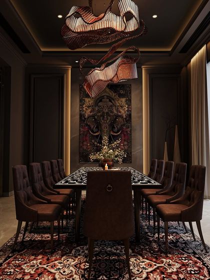 A front-on view of the sculptural dining area, emphasizing the symmetry of the space and the powerful presence of the artwork and oversized rug.