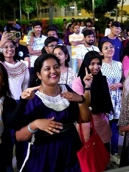 More happy faces in the crowd, singing along during our World Music Day performance.