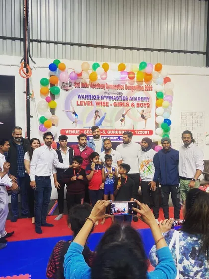The prize distribution ceremony at the Inter-Academy Gymnastics Championship in Gurugram. My student stands proudly on the podium after winning a medal.