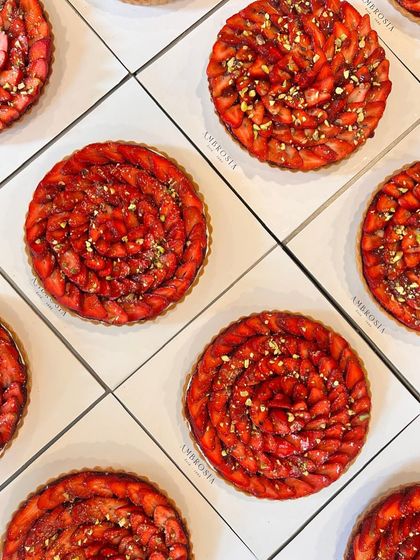 An overhead view of our strawberry tarts, ready to be delivered for a special celebration.