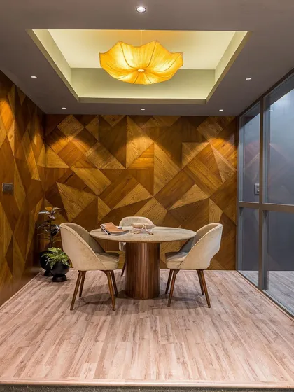 The discussion room is a showcase of craftsmanship, designed to inspire clients and demonstrate the beauty of wood veneer.