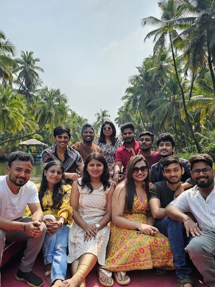 A happy group photo during the Honnavar backwater boating tour.