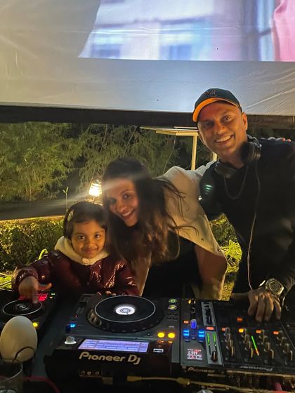 Sometimes the youngest guests are the biggest fans. Here I am at a private New Year's Eve wedding party in Coonoor, where even the little ones wanted a turn at the DJ console.