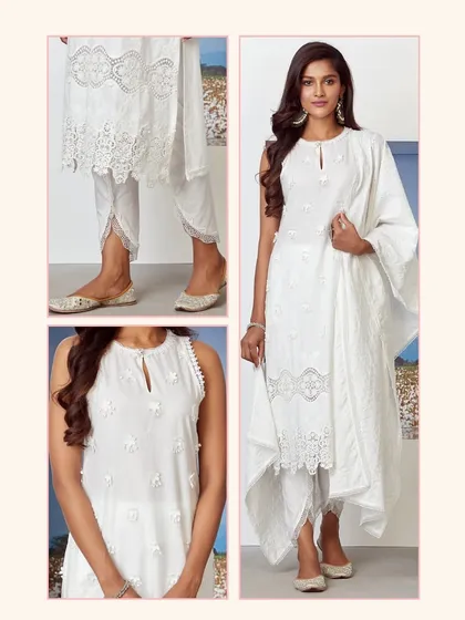 The complete Paradise White Kurta Set. It features a sleeveless kurta with delicate embroidery and stylish dhoti pants for a fun, contemporary silhouette.