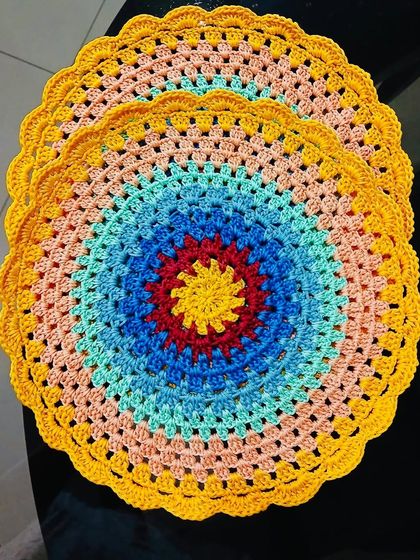 A vibrant, multicolored centerpiece with a rainbow of colors spiraling out from the center. This piece is sure to brighten any room.