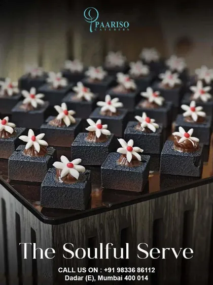 A perfect end to any meal, our desserts are crafted to be as beautiful as they are delicious. These bite-sized chocolate creations, each meticulously decorated, are arranged to create a stunning display that will delight your guests.