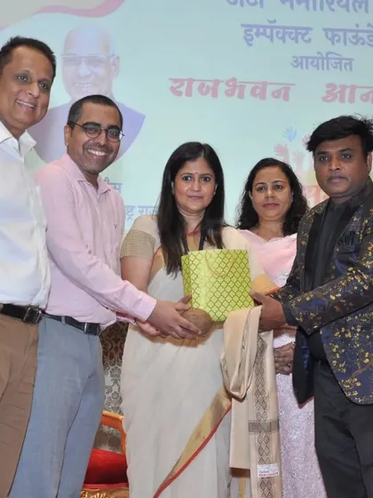 Receiving a token of appreciation at the Raj Bhavan event. It was a meaningful day of magic for a great cause.