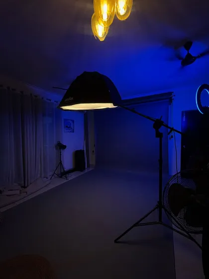 Our Greater Noida studio, set up and ready for a session. We use professional lighting like this large octabox to create soft, flattering light that is safe for a newborn's sensitive eyes.