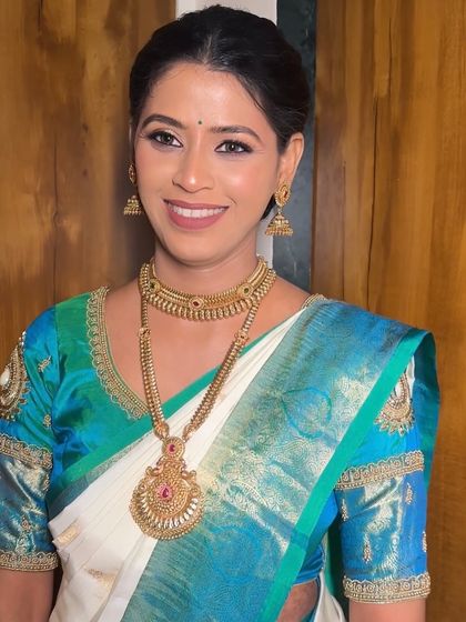 The serene divinity of her Buddhist wedding look. We opted for fresh, understated makeup with a soft pink lip and clean eyes to match the peaceful and elegant vibe of the ceremony.