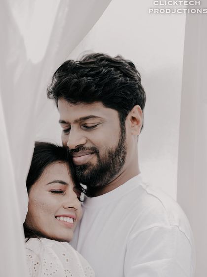 An intimate close-up of a couple embracing, their faces close together, conveying a sense of peace and love.